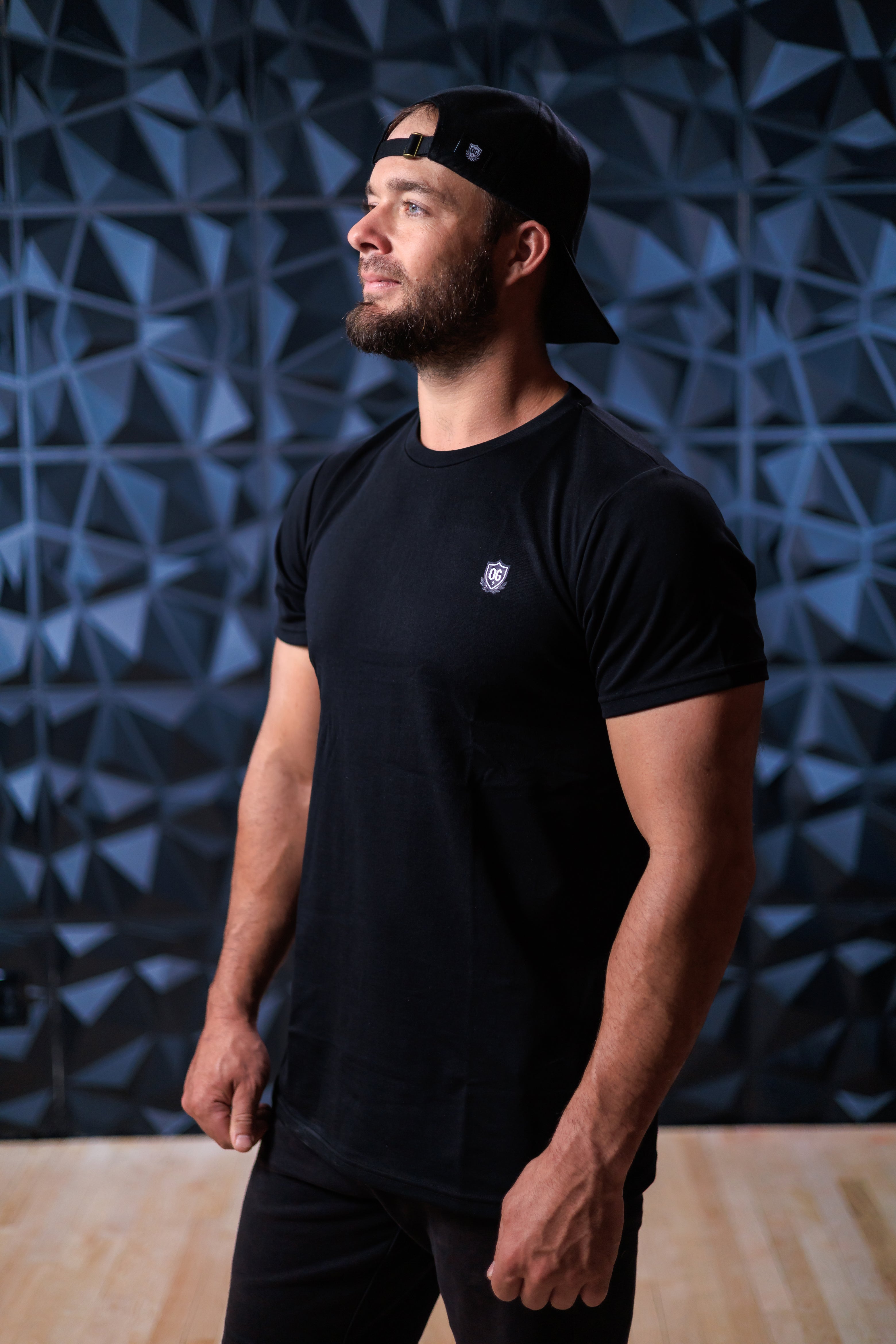 Man wearing black EMF blocking t-shirt