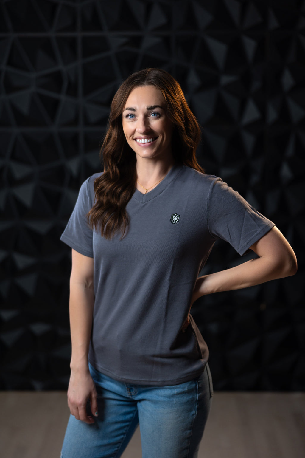 Woman wearing grey EMF blocking t-shirt