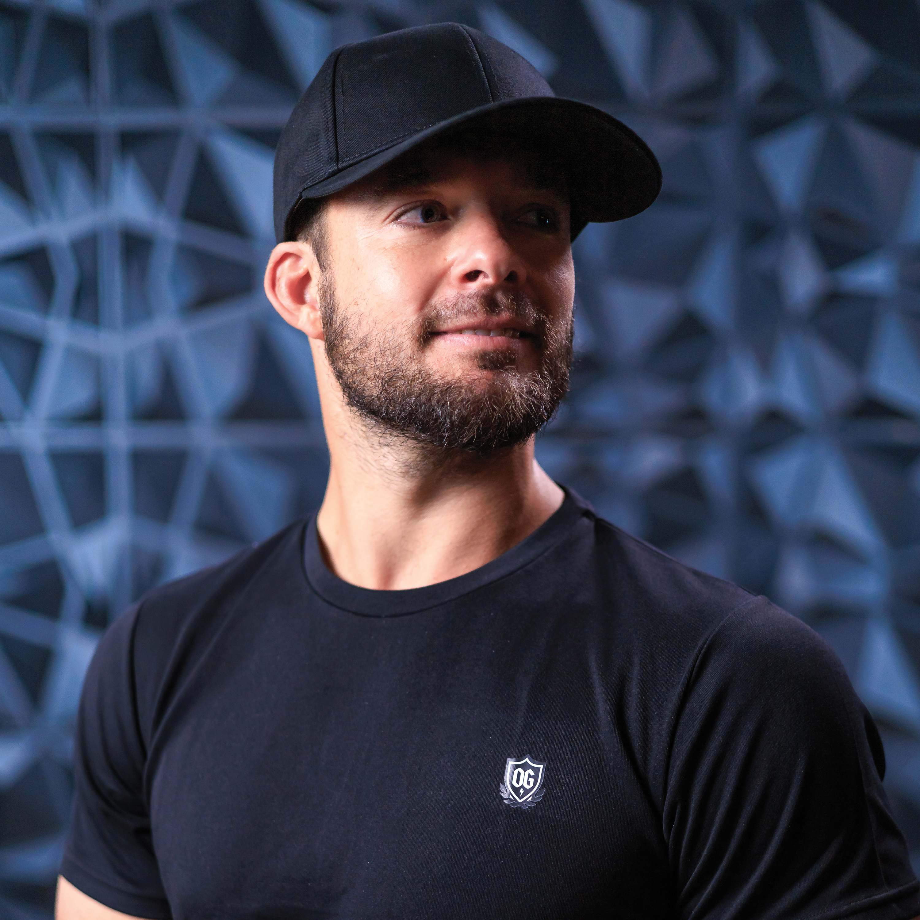 Man with black ball cap on head